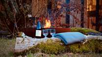 Gather around the fire pit with your favourite tipple for dreamy evenings under the stars...