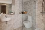 This calming en suite also promises underfloor heating and a walk-in shower...