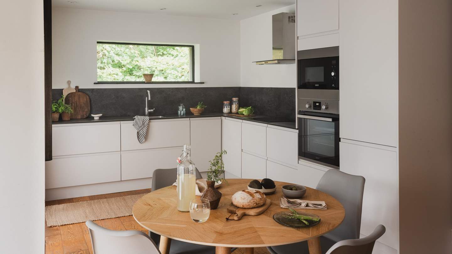 You'll find an electric oven, microwave, induction hob, dishwasher, washer-dryer and an Nespresso coffee machine within our romantic abode