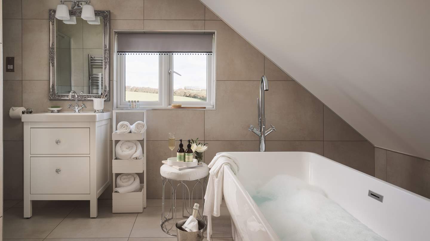 The Master en suite with freestanding bath and separate walk in shower