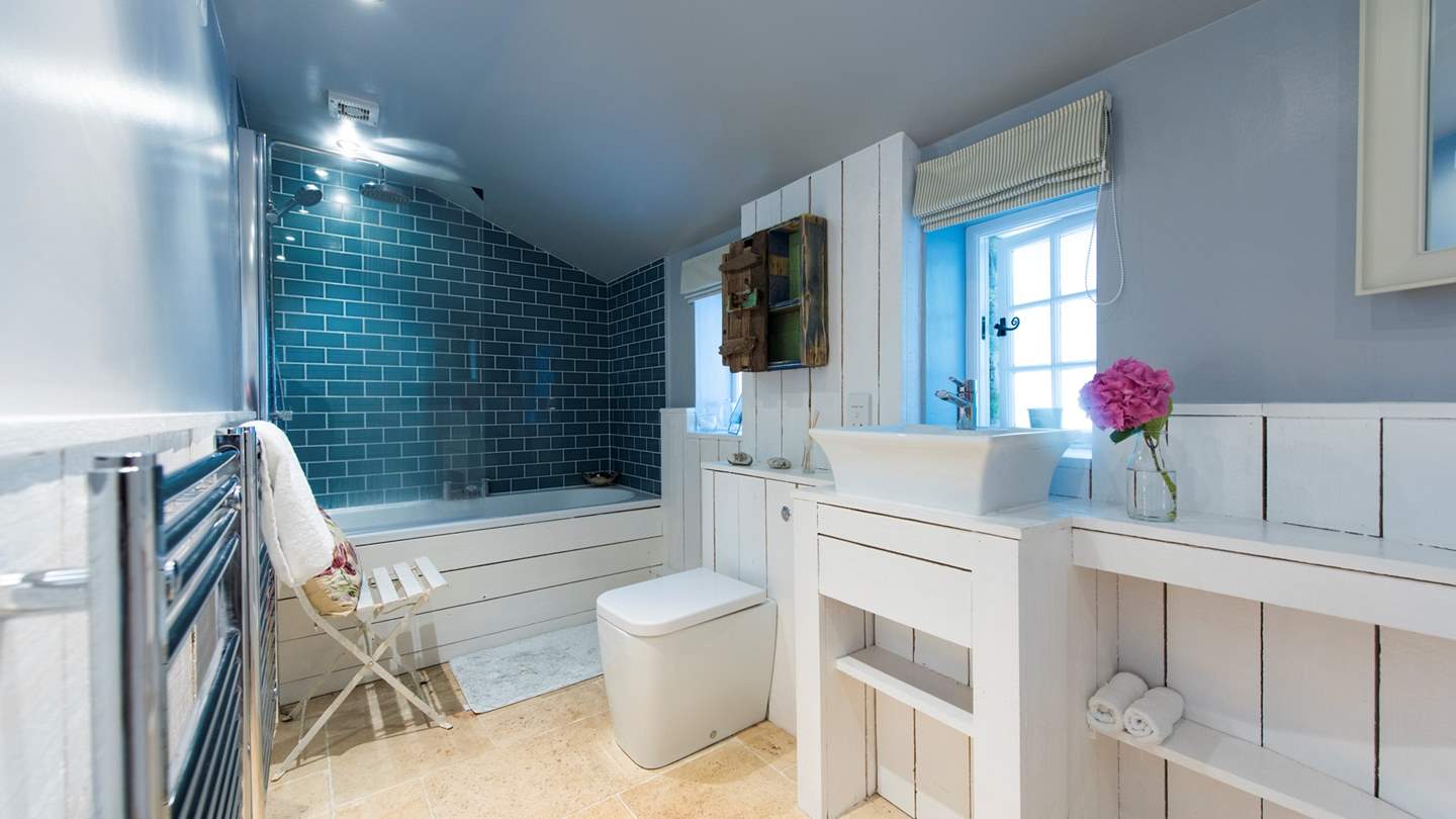 The family bathroom offers a place to relax and reset

