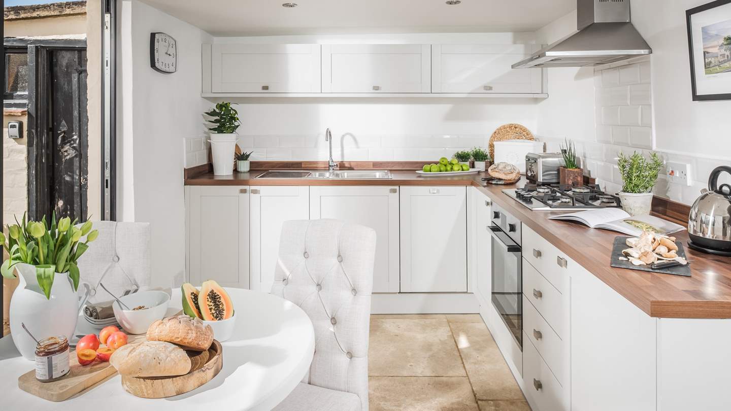 The perfectly-equipped kitchen has everything you'll need to rustle up meals and snacks
