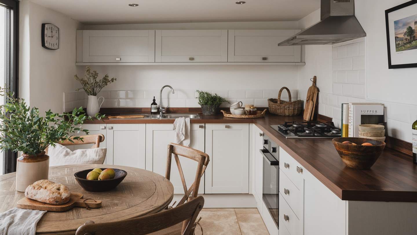 The delightful kitchen has all the appliances you'll need to rustle up feasts for your loved ones