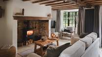 Evoking an effortless countryfied feel the living room offers endless Cotswolds cottage charm

