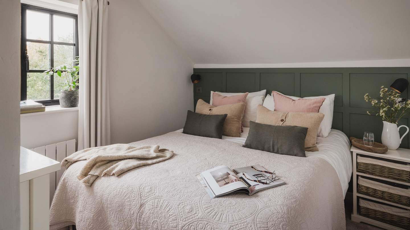 The second bedroom is a petite and cosy version of the former but just as heavenly and charming