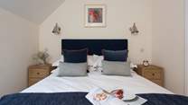 There are three fabulous bedrooms to fall into at the end of a busy day on the beach