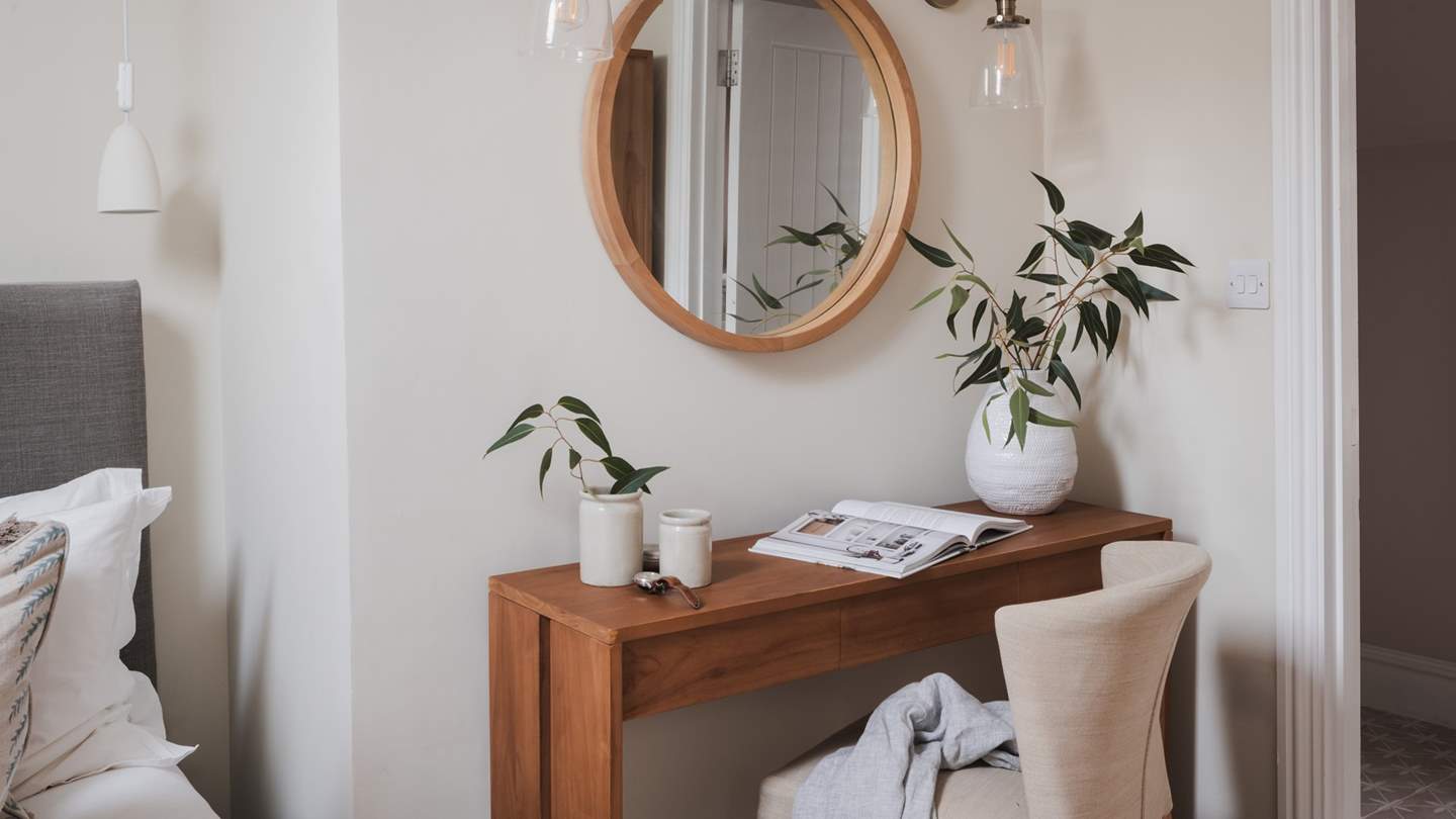 A dressing table promises a serene setting for pampering moments