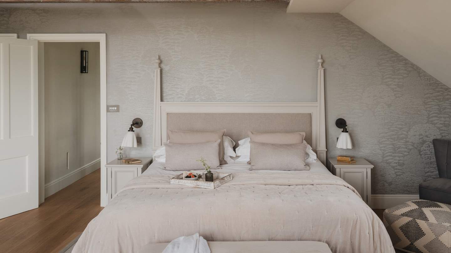 Exposed beams and sumptuous soft linens beckon for blissful slumbers...