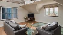 The cosy upper sitting room is perfect for adults seeking a little seclusion