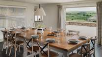The bespoke, hand-crafted dining table is made locally from oak and is the perfect setting for moments of togetherness 