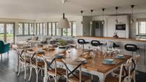 The beautiful living, kitchen and dining area occupies over half of the ground floor