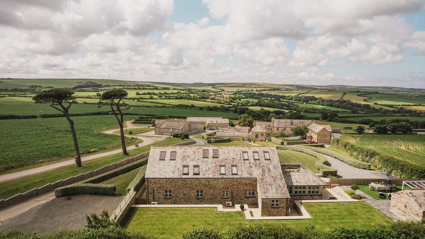 Part of the revered Trevear Farm, this grand retreat is set amongst rolling countryside surrounded by 75 acres of arable farmland
