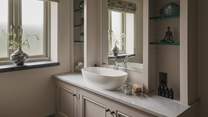 Savour refreshing wake-me-ups in the delightful en suite