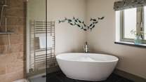 Bedroom five has use of the family bathroom with freestanding bath and shower-room

