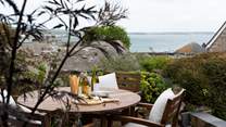In the morning, make the most of the sunshine with al fresco meals on the table and chairs