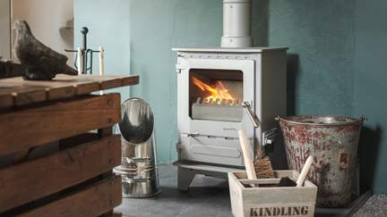 The darling wood burner creates a cosy ambience whatever time of year