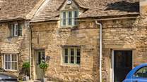 A warm welcome awaits within this stunning sandstone cottage...