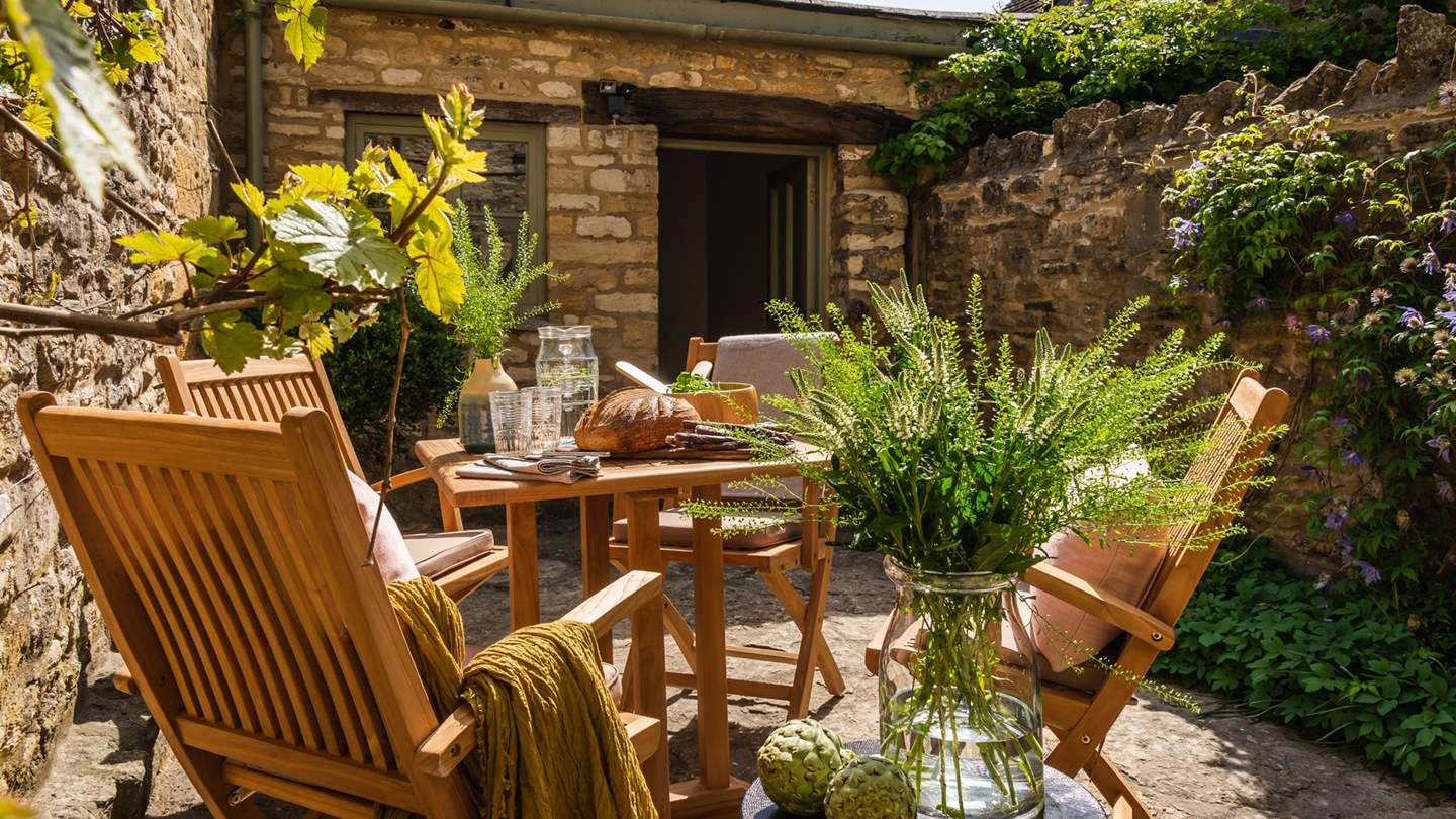 The sun-soaked garden is just perfect for alfresco meals