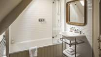 There's a family bathroom complete with bath and overhead shower - perfect for long soaks or quick wake-me-up showers in the morning
