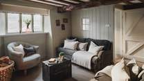 Sumptuous grey velvet sofas ensure you'll be oh-so-comfy after a day out exploring