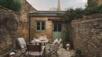 Step outside to uncover a charming courtyard