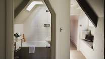 The family bathroom comes complete with bath and overhead shower -  perfect for long soaks or quick wake-me-up showers in the morning