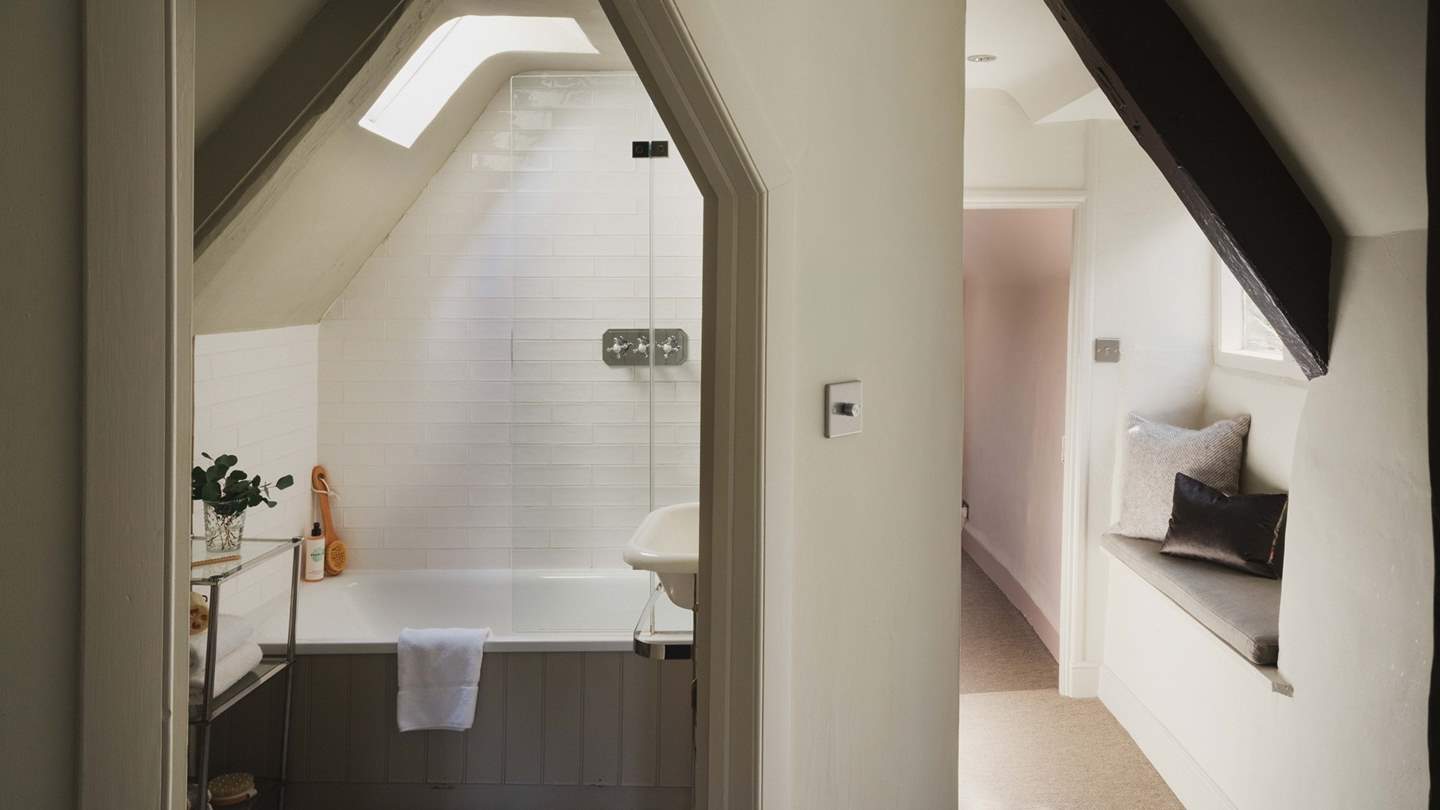 The family bathroom comes complete with bath and overhead shower -  perfect for long soaks or quick wake-me-up showers in the morning