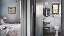 This bedroom is just a step away from the family bathroom