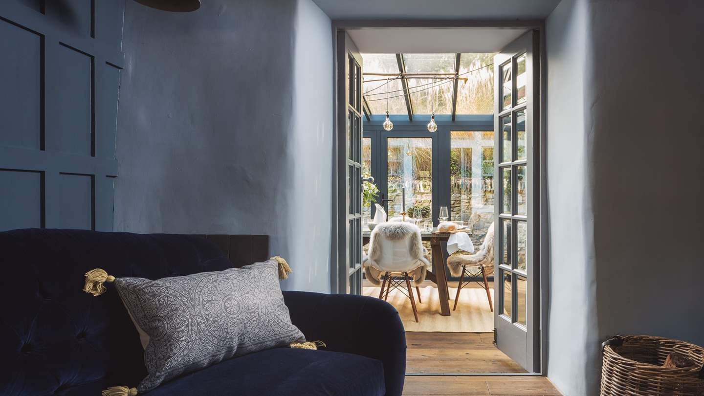 An ancient doorway leads through to the light and airy dining room