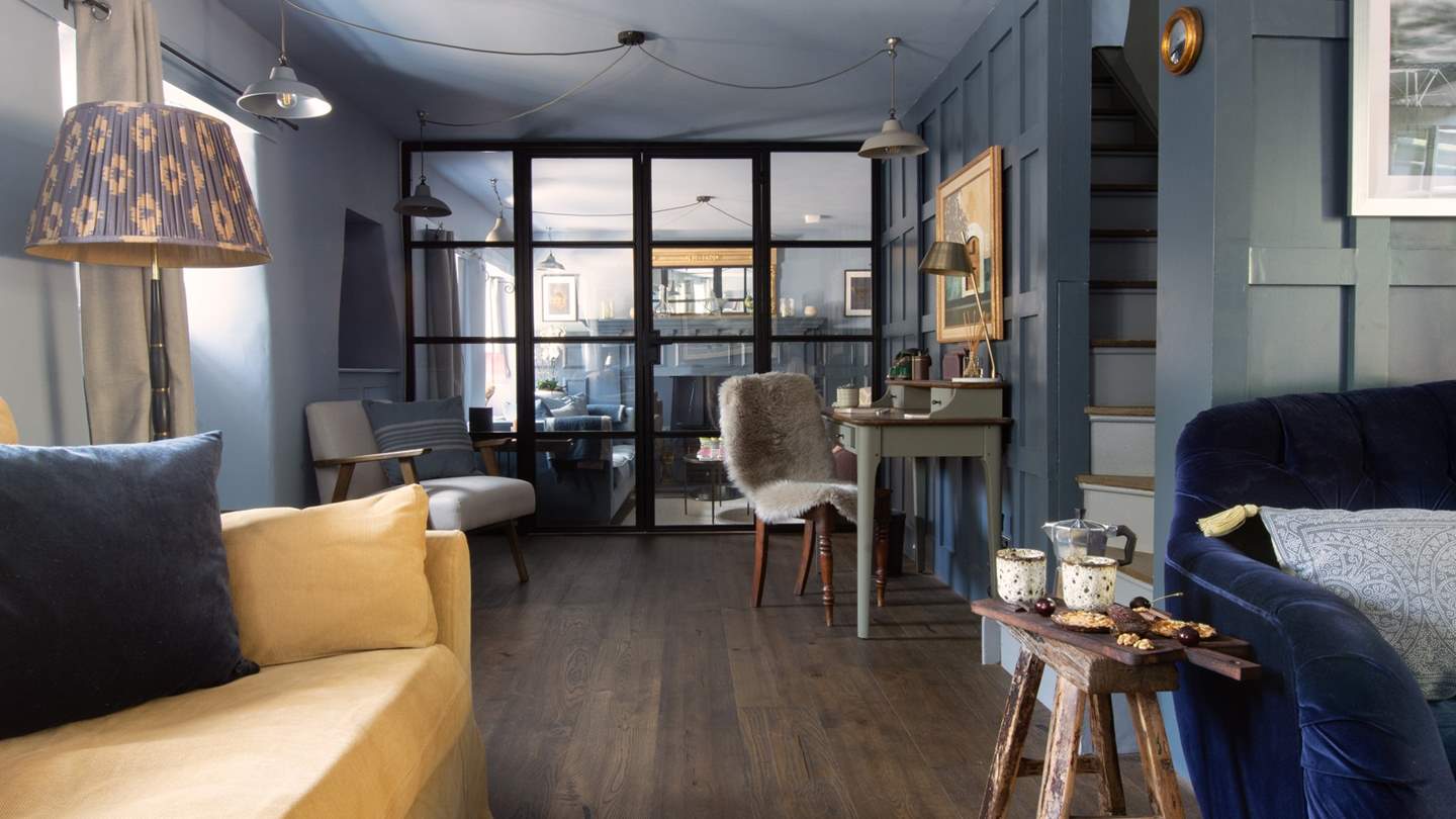 The gorgeous panelled walls make this a chic, luxurious space