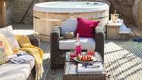 The hot tub and outdoor seating - the ultimate spot to hang out on a lazy day