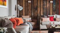 We just love the exposed, reclaimed wood panelling