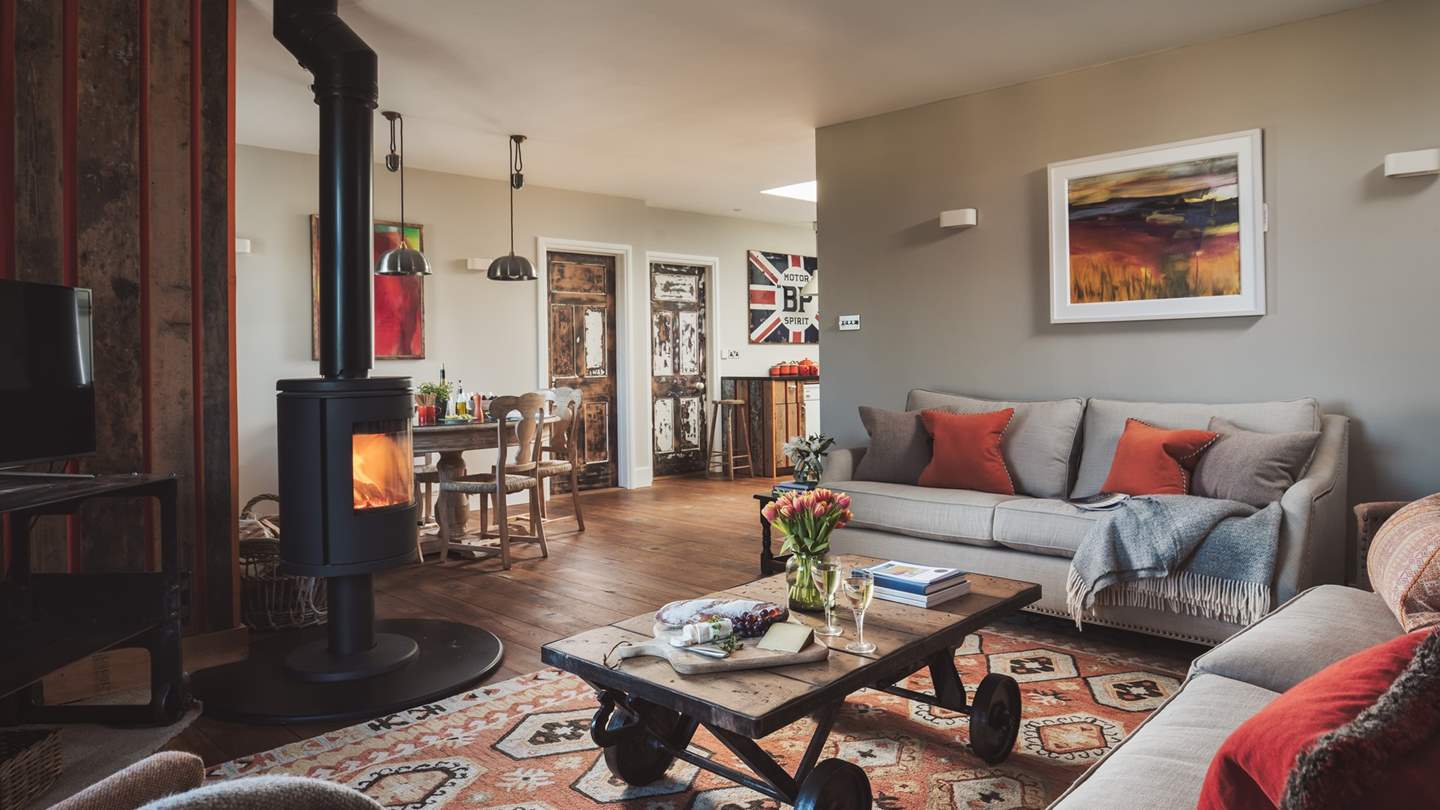 The open-plan living, dining and kitchen area is oh-so laid back, perfect for holidays