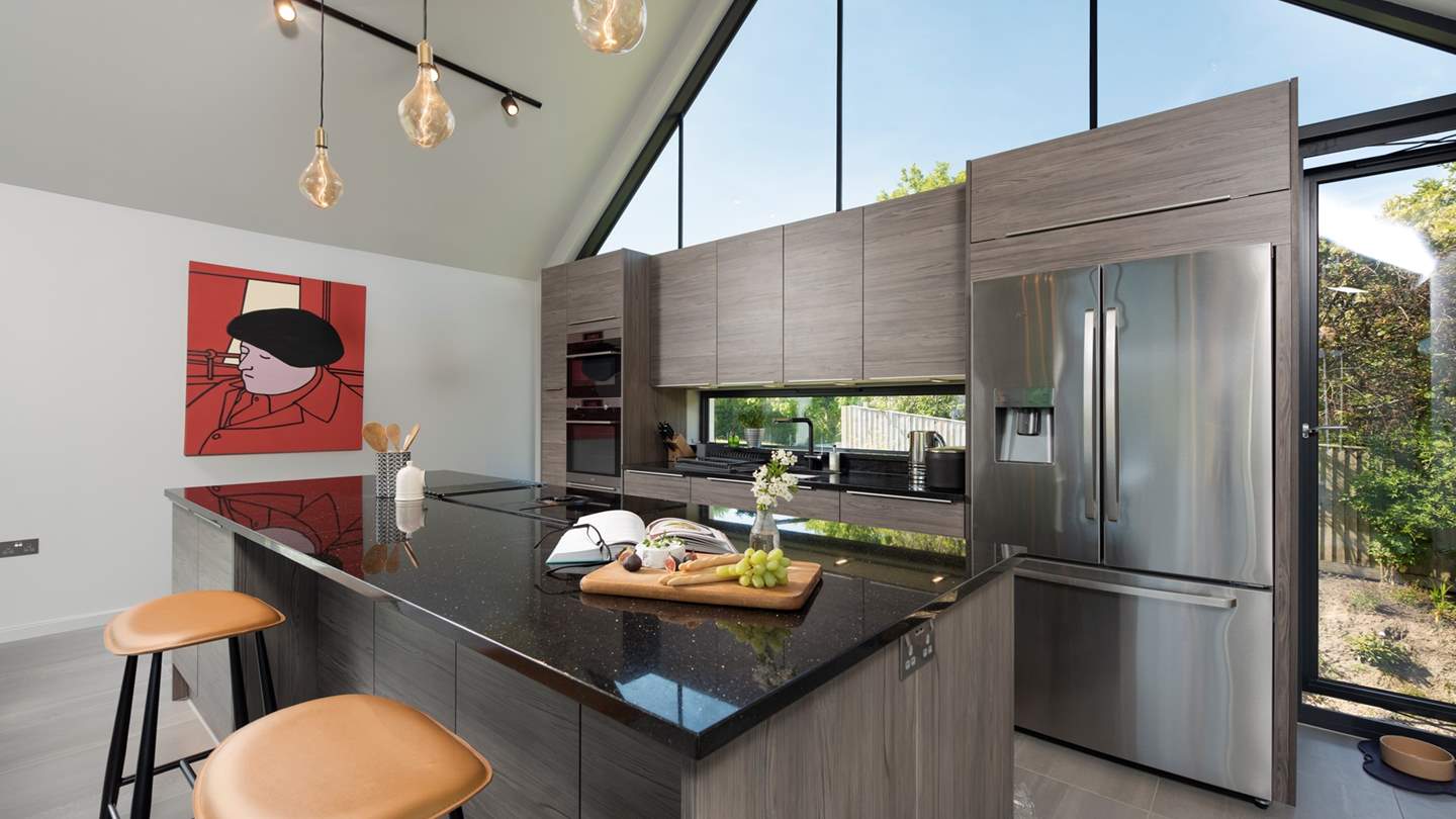 The chic kitchen is fully-equipped with everything you'll need to rustle up a feast or two