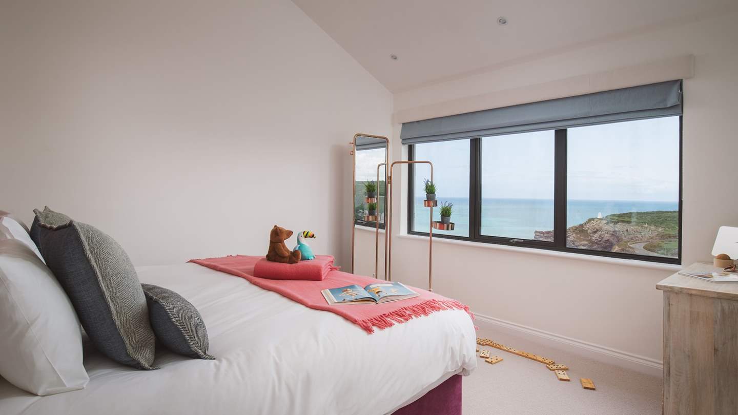 Bedroom two is the on first floor with zip and link beds (6' double or twin beds) and use of the family bathroom