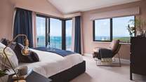 The master bedroom, with epic sea views and its own terrace