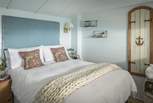 The bedroom has a blissful double bed to retreat to at the end of the day