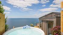 Spend time in the hot tub whilst gazing at the sea