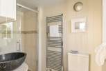 The shower room with heated towel rail