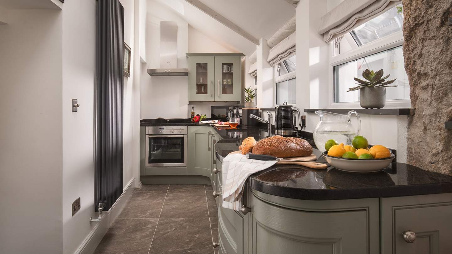 The fabulous galley kitchen has everything the cooking connoisseur needs to rustle up feasts