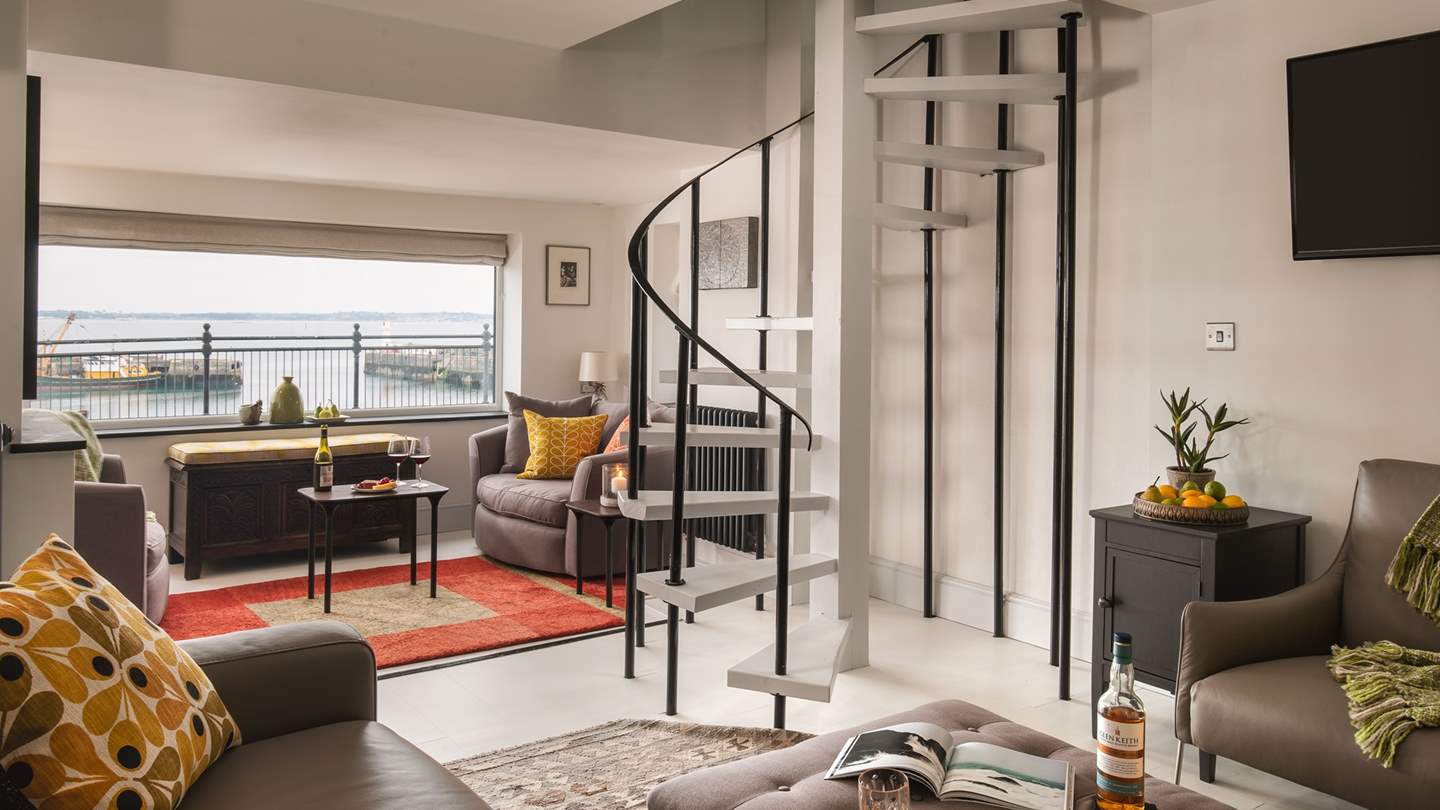Take the spiral staircase up to the bedrooms
