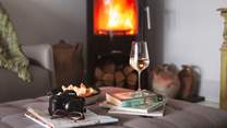 The roaring wood burner offers a cosy escape during cooler months