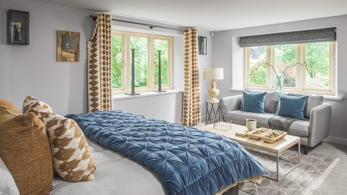 The master bedroom is just beautiful, we love the sofa for private relaxation...