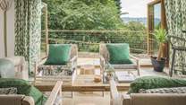 Bi-fold doors bring the outside in on warmer days, so you can be accompanied by the sound of birdsong...