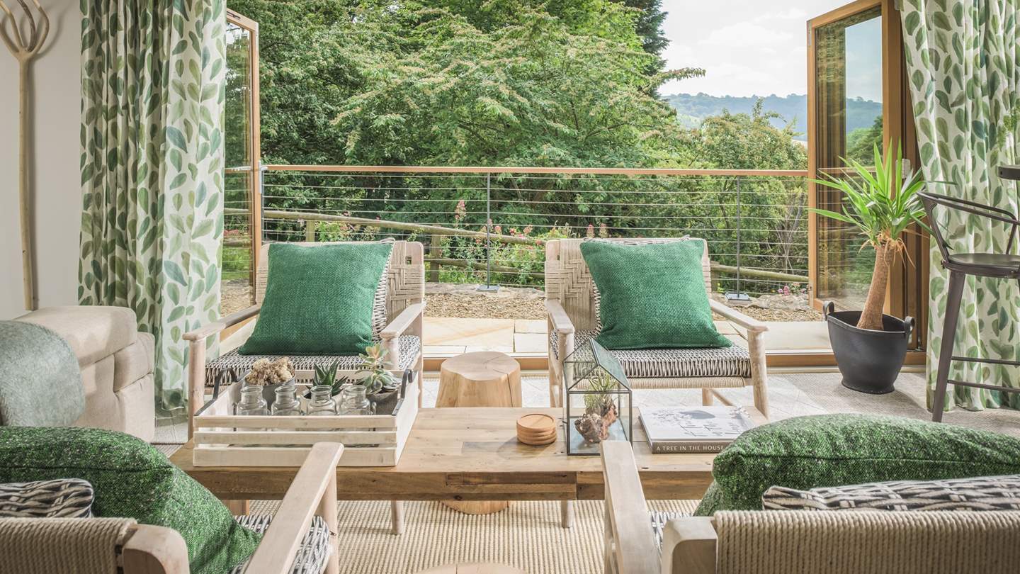 Bi-fold doors bring the outside in on warmer days, so you can be accompanied by the sound of birdsong...