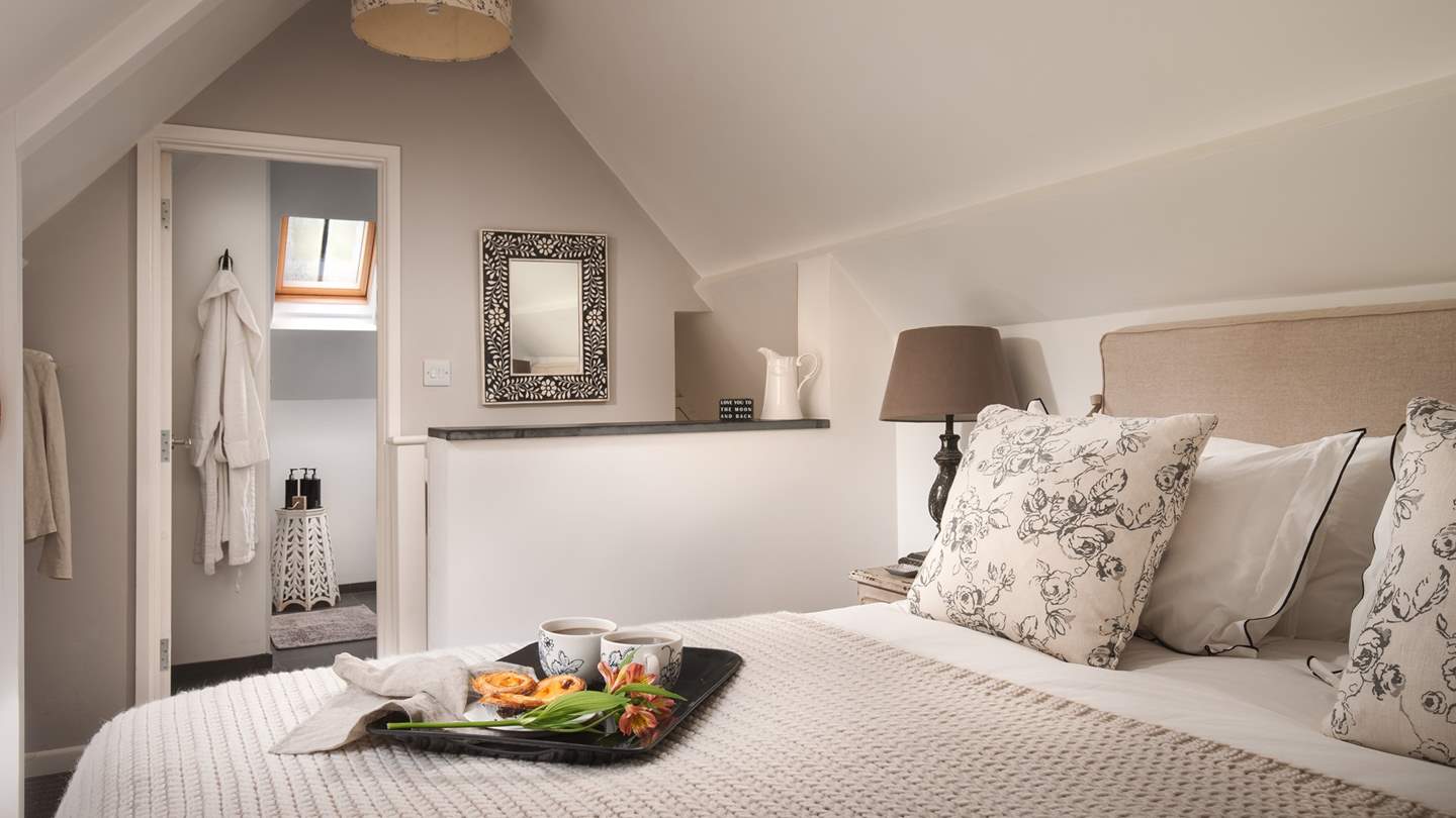Chicly romantic, the bedroom, hidden amongst the eaves, is your own little Eden to retire to at the end of the day