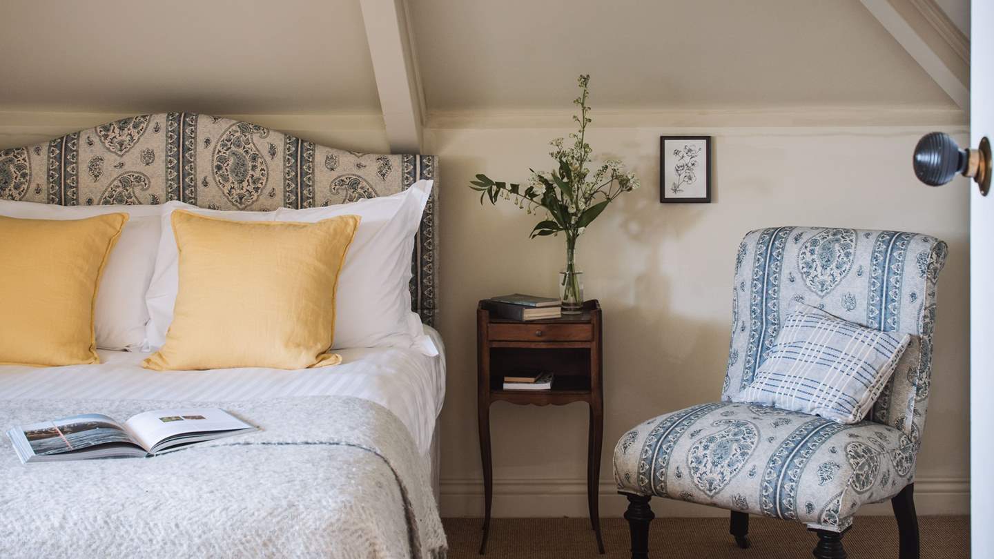 We just adore the matching print on the occasional chair