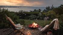Gather beside the firepit with a glass of something special and admire the unrivalled sea views... 