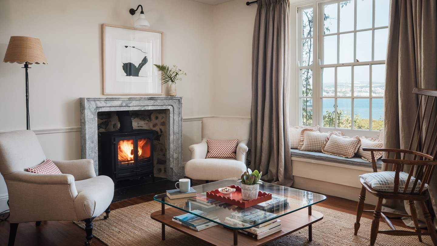 In the hall, you'll find a stunning marble fireplace, hand carved locally by Duke Stone of Cornwall