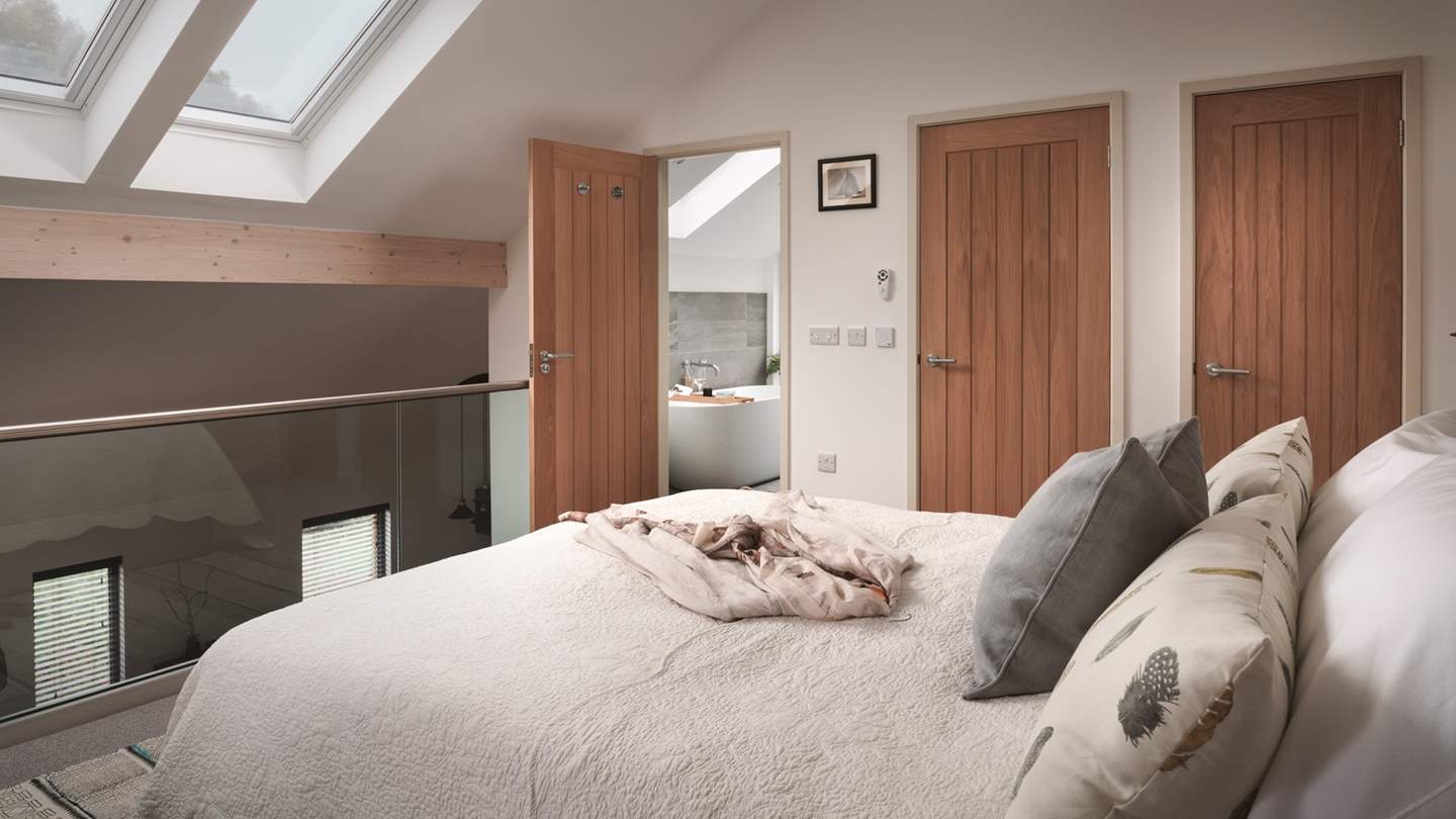 Up on the mezzanine, you'll find the pretty sleeping area....just dreamy!